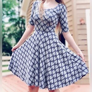 LuLaRoe Nicole Navy and White Peacock Pattern a-line Dress